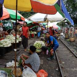 Vendors along the tracks at Daryingon station.