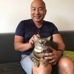 Me enjoying quality time with Skittles on my lap.