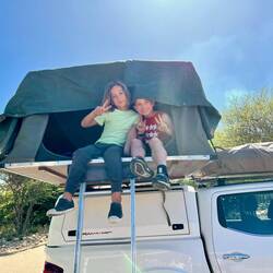 Cruz and me in the tent on top of the truck