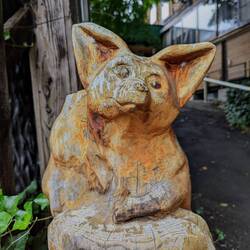 At first, the foxes looked as sad as this statue 😔