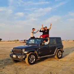 Crazy Kuwaitis racing their huge pick-ups on the beach