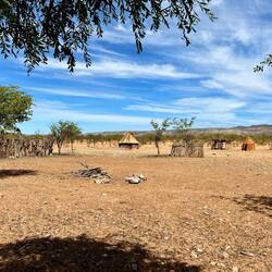 Some houses in the village and the sacred space in the center