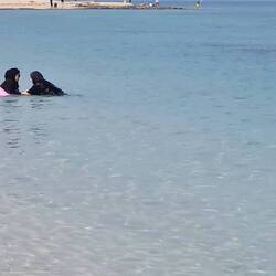 Women swimming in Burkini
