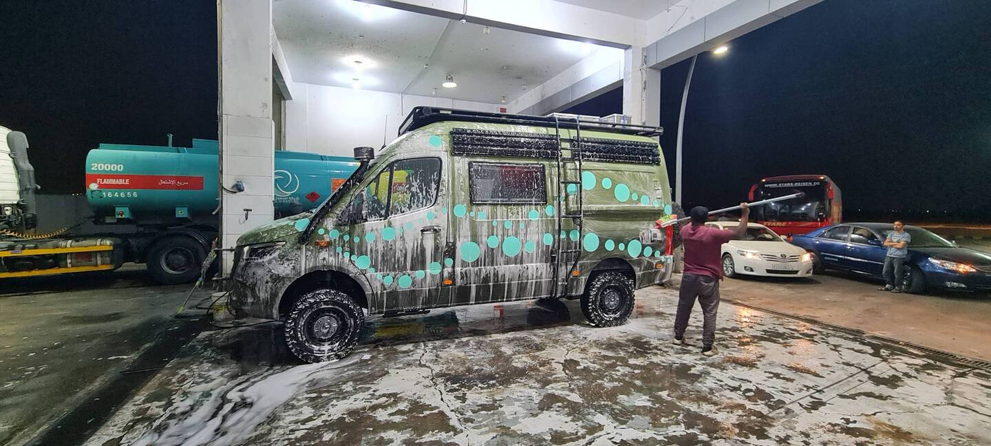 The most important thing when driving into the sand dessert, wash your car!