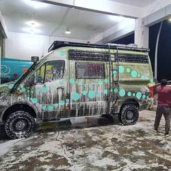 The most important thing when driving into the sand dessert, wash your car!