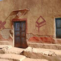 Trip to Mecca by plane painted on the wall of this house