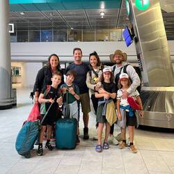 us and the Benwells at the airport heading to Cape Town