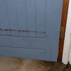 The line on the door shows how high the water got during the floodings