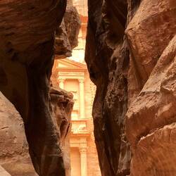 Peekaboo view to the Treasury as you wind down the canyon