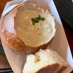 Clam chowder in a sourdough bread bowl