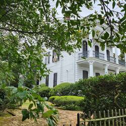 Built in 1853 for John Rodenberg. There have been many weddings and Mardi Gras parties here.