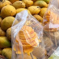 Love this mango on a stick