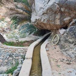 The Levada disapears under a huge rock and comes out on the other side.
