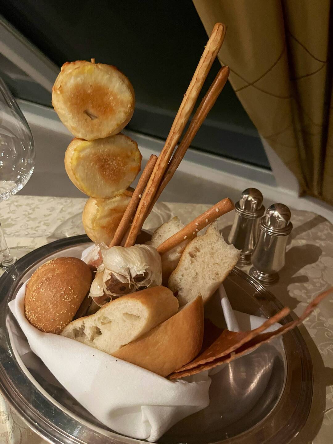 Bread basket includes roasted garlic bulb