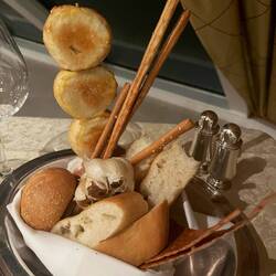 Bread basket includes roasted garlic bulb