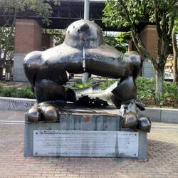 The original damaged Bird of Peace statue with the names of the bomb victims.