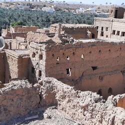 A whole town of mud houses slowly collapsing