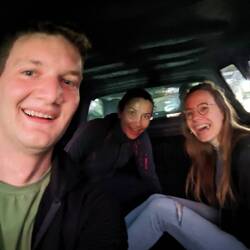 Us in the back of the pick-up truck that brought us across to the other side.