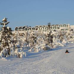 The resort and a tobogganer having fun