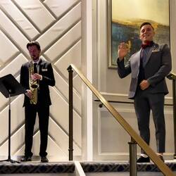 Chase and Ilya welcome us as we come up the stairs — RTW Dinner.