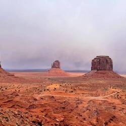 The snow flurries in the distance