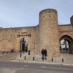 John and Emily in front of the Puerta de Almocábar- 13th century