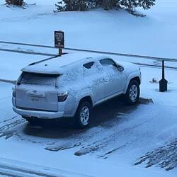 Our car covered in snow