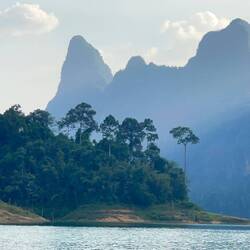 Beams of light as the sun set behind the mountain