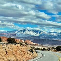 You look up from the red rock and see snow - amazing contrast