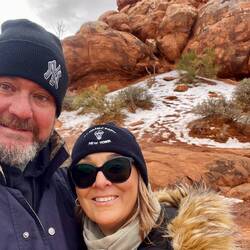 Selfie, snow and red rock