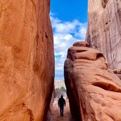 Walking out of Sand Dune Arch