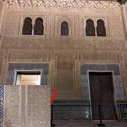 A wall of the Madrid Palace. In the lower left is a close up of the decoration