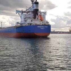 Big ship with a survival capsule on the back.