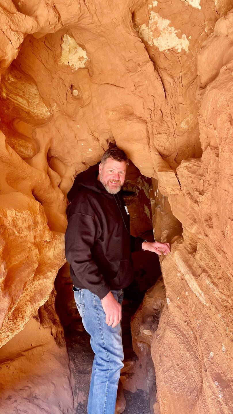 Dave tried to get all the way into the cave but it got too small