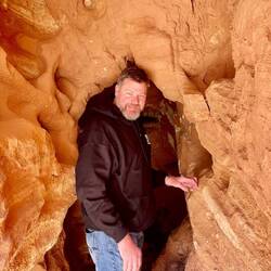 Dave tried to get all the way into the cave but it got too small