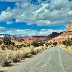 Everything in the photo, desert, cliffs, red rock and snow
