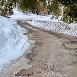 The snow banks on the road leading out of the overlook