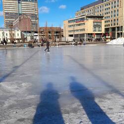 Ice skating rink outside our hotel in the background