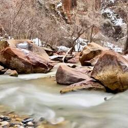 Beautiful smooth stones at the bottom of the river bed