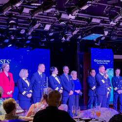 The senior officers of Insignia introducing themselves at the Captain's Welcome Celebration.
