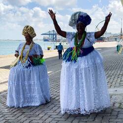 Two Baiana women welcome us to Brazil's first capital — Salvador de Bahia.