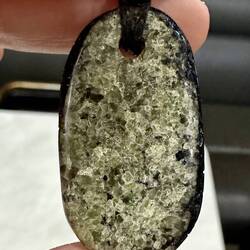 The boys got this for being the last kids standing - polished olivine necklace