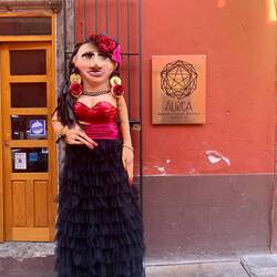 Mojigangas, 15 feet tall, outside shops & in the streets