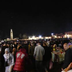 Jemaa El Fna Square comes alive at night(our guide in black, bottom right corner, in front of Oliver