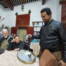 Our guide Hassan pouring Moroccan mint tea
