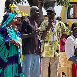 The Village Leader (brown shirt)