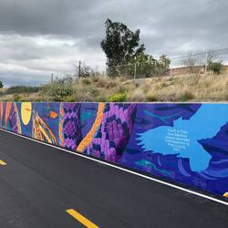 New murals on the Loop by Country Club Road