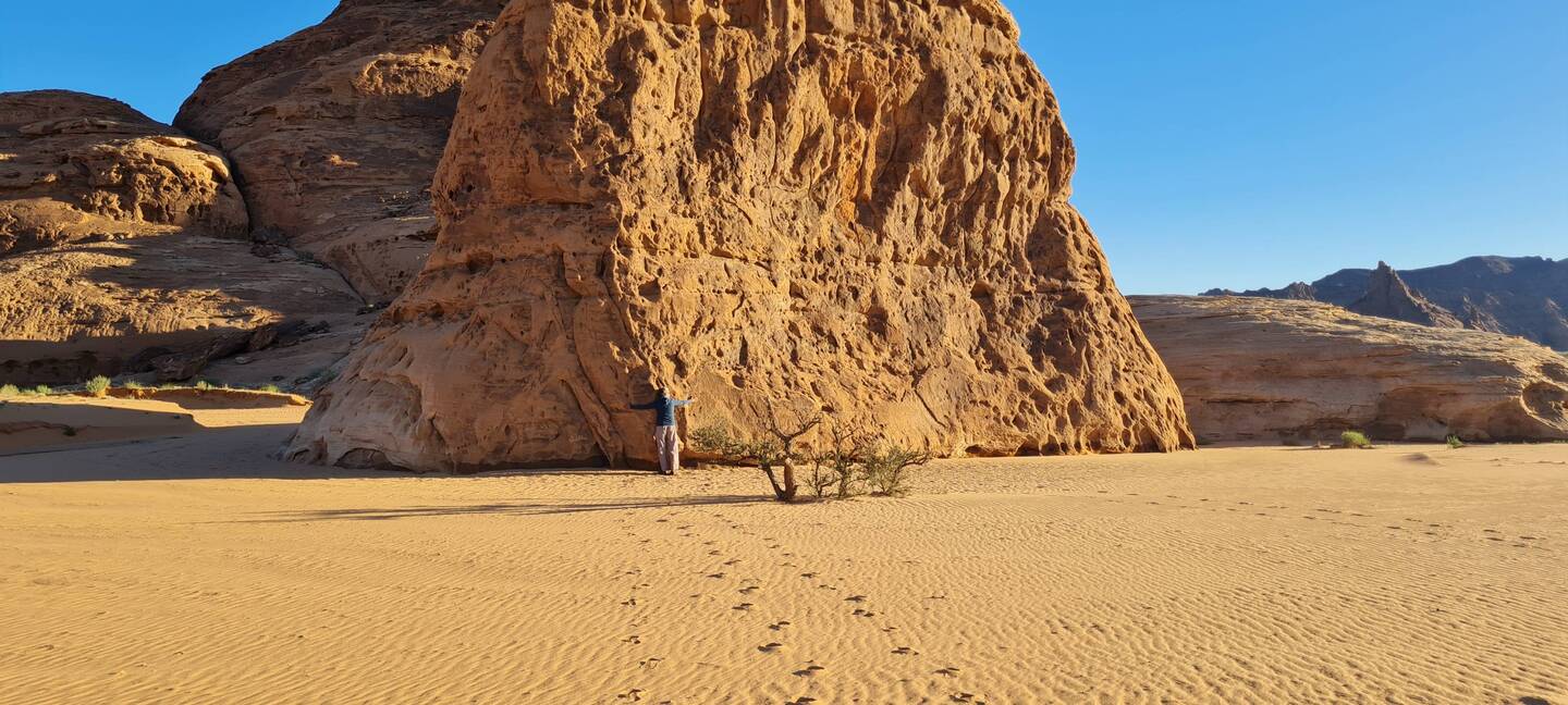 Some people hug trees, others hug rocks, really big ones