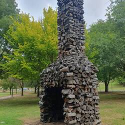 Arty wooden fireplace by Marcus Tatlow - also worked in Southern forest in 90's making drums