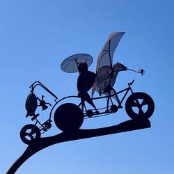 Love this sculpture sbove the bike path